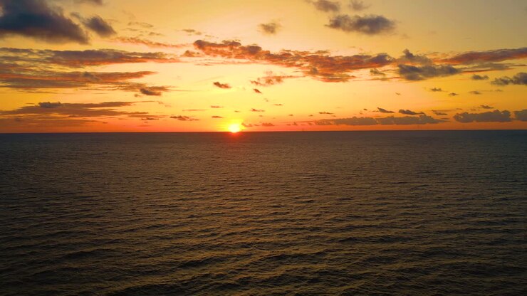 Aerial view of sunset horizon over the sea