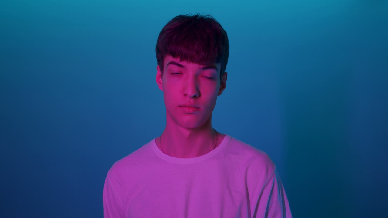Portrait of a Young Man in Studio Lighting