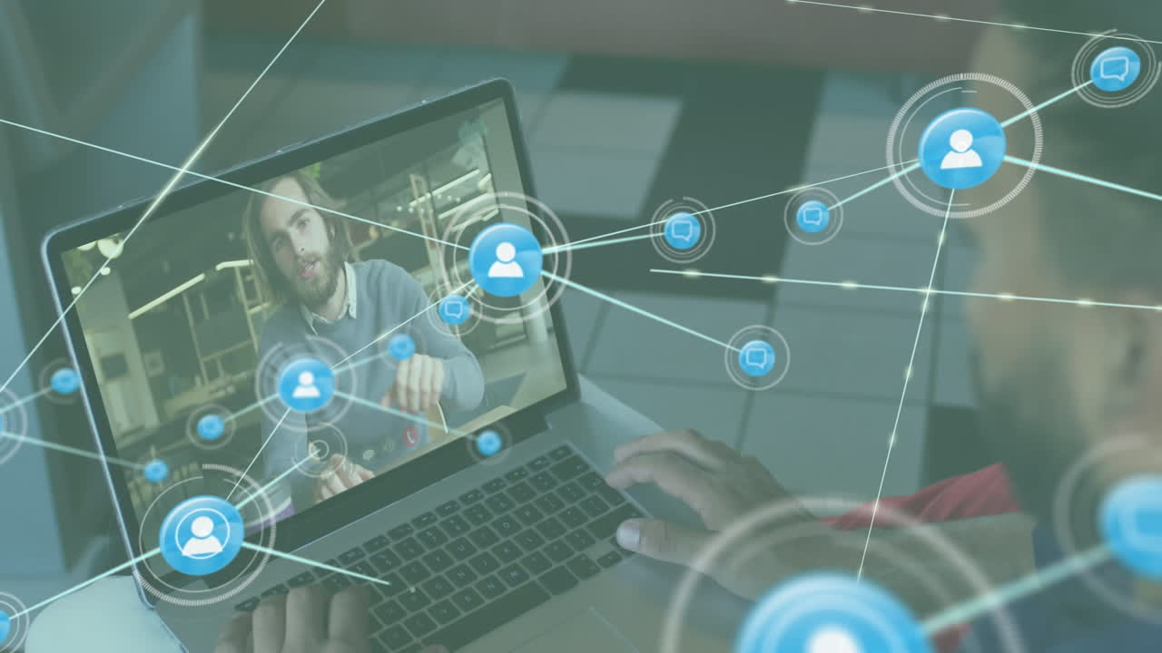 노트북에서 비디오 통화를 하는 두 인종의 남성의 뒷면을 배경으로 디지털 아이콘 네트워크의 애니메이션