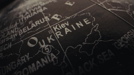close-up of a globe focusing on ukraine