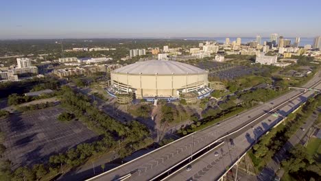 4k aerial drone video of interstate next to tampa bay rays tropicana field in downtown st