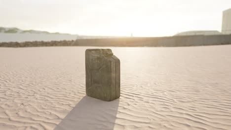 old rusted fuel can on the beach