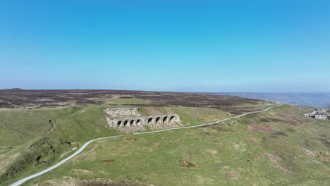 Rosedale-Abbey-Iron-Calcining-Kilns,-Aerial-Footage,-North-York-moors-National-Park,-Rotation-around-Kilns