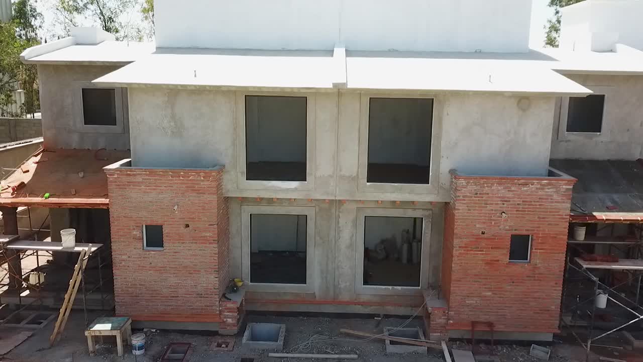 Drone sweep of construction workers during the development of a residential complex in the metropolitan area of Mexico City