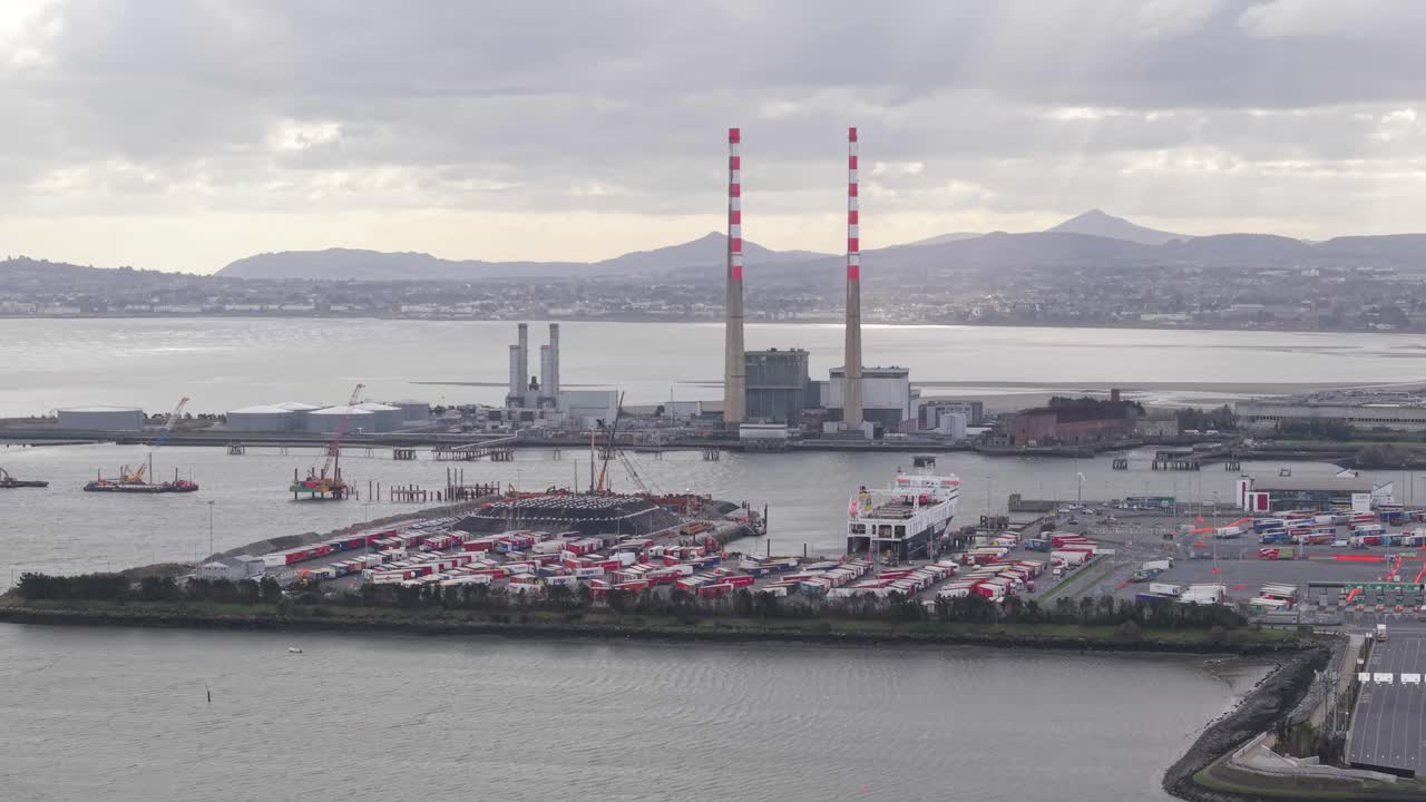 Seaport With The Famous Poolbeg Chimneys In Poolbeg Power Station, Dublin, Ireland. Aerial Wide Shot