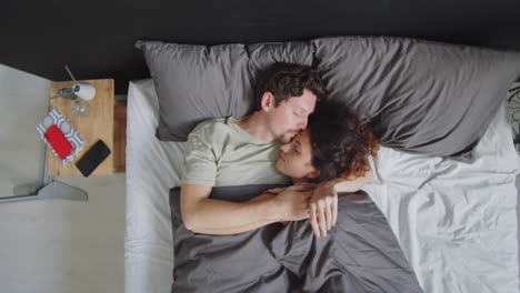 couple sleeping in bed