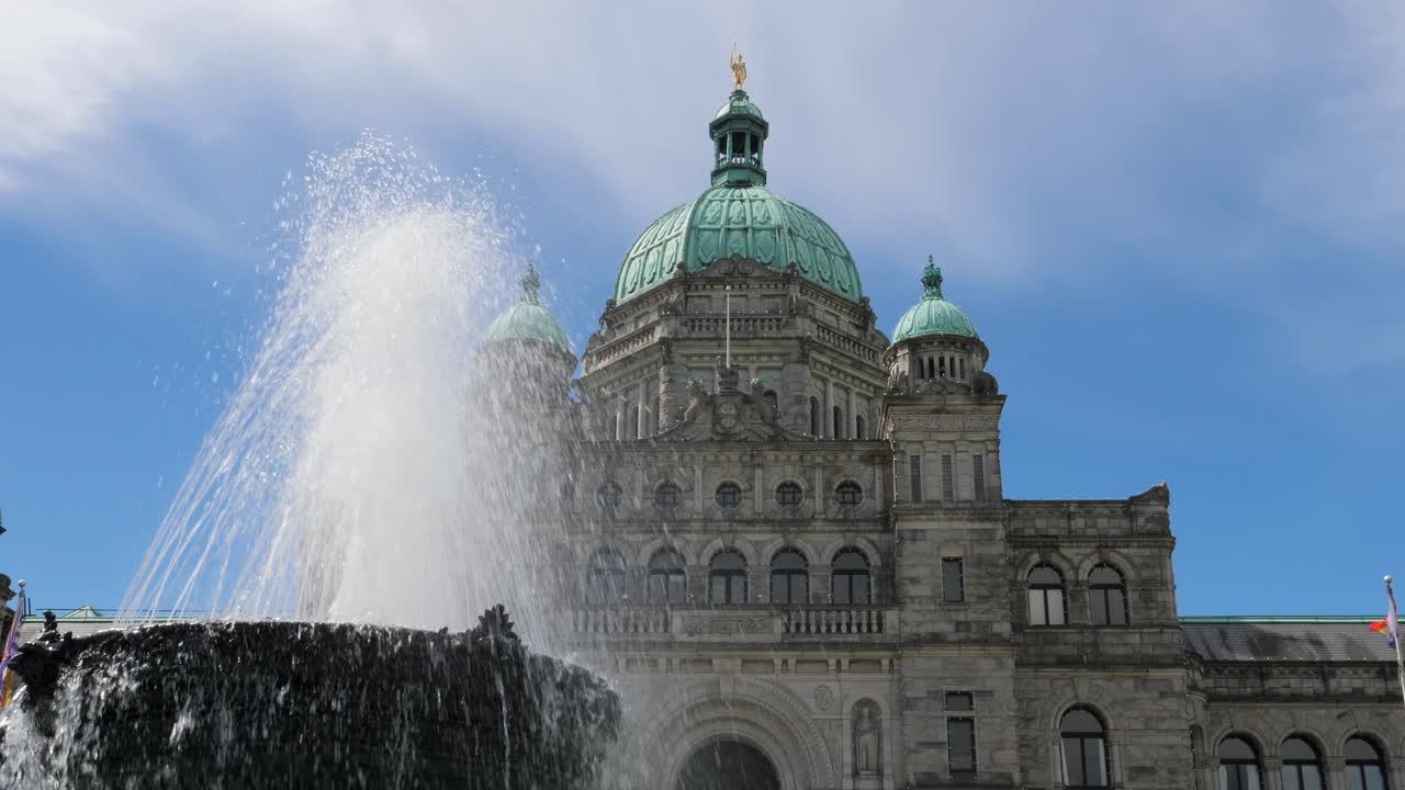 The Centre Fountain and Main block of the Parliament Buildings in Victoria, Canada, British Columbia.