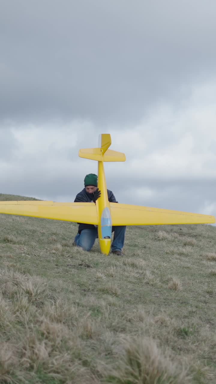 Model Airplane on a Hill