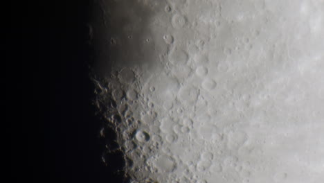 extreme close up of the moon slowly moving