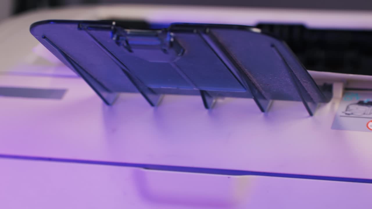 Closeup of a printer's parts and instructions