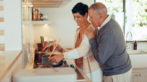food, cooking and a mature couple in the kitchen