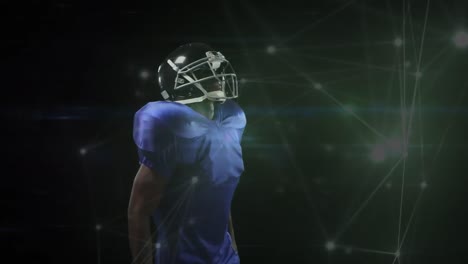 Animation-of-network-of-connections-over-african-american-american-football-player