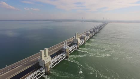 aerial: the famous storm surge barrier in the south west of the netherlands