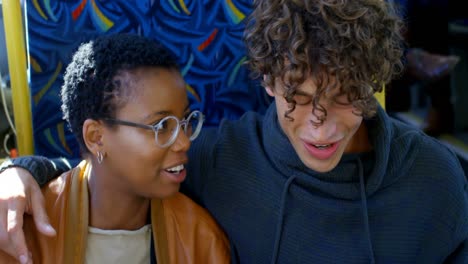 couple interacting with each other while travelling in bus 4k