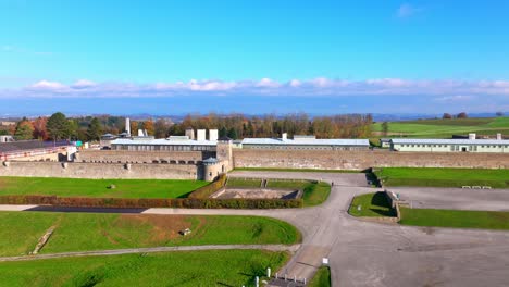 mauthausen, upper austria - a comprehensive panorama of the grounds at mauthausen concentration camp - aerial pan left