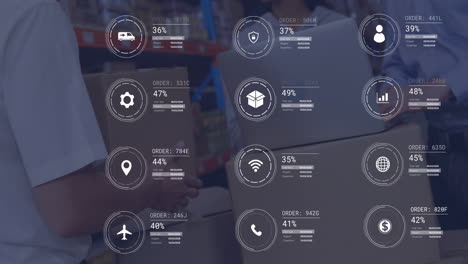 Animation-of-data-processing-against-two-caucasian-male-supervisor-keeping-a-box-at-warehouse