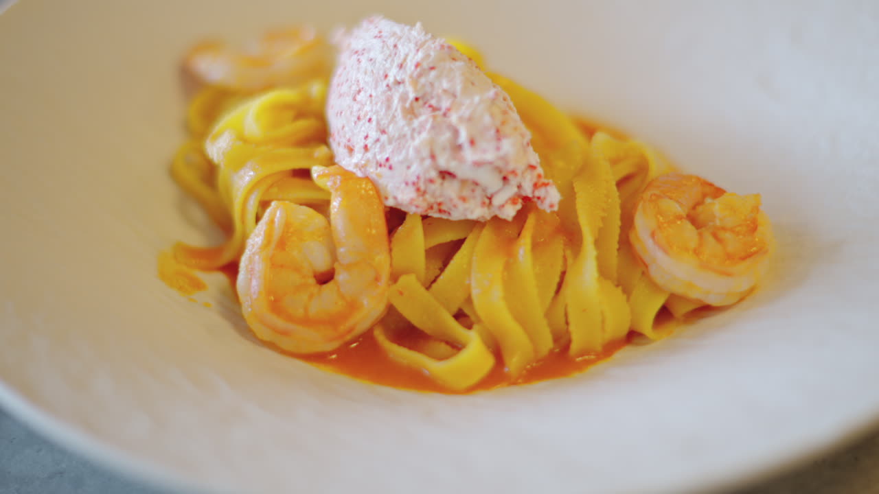 Fresh seafood pasta with shrimps and butter