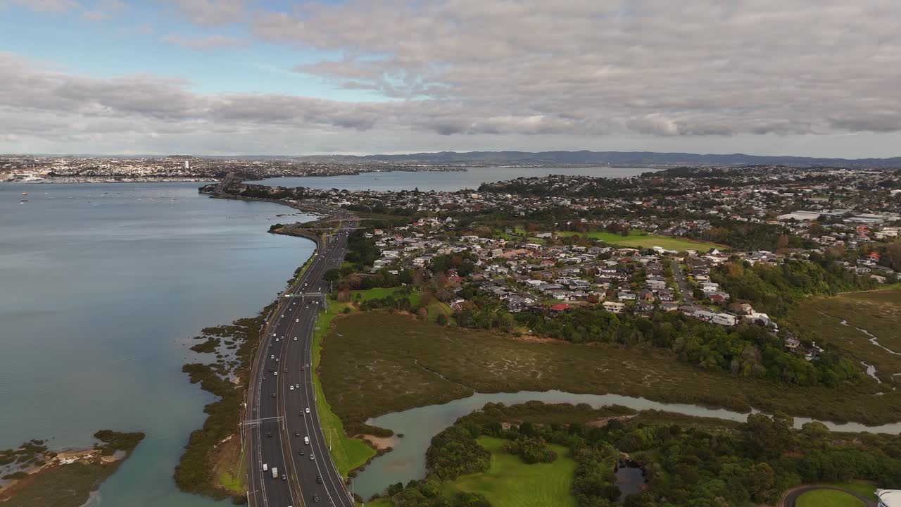 Aerial Shot Of Northcote Area, Shoal Bay And City traffic, Auckland City, New Zealand