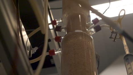 testing sample water from a wastewater facility with sand and dirt.