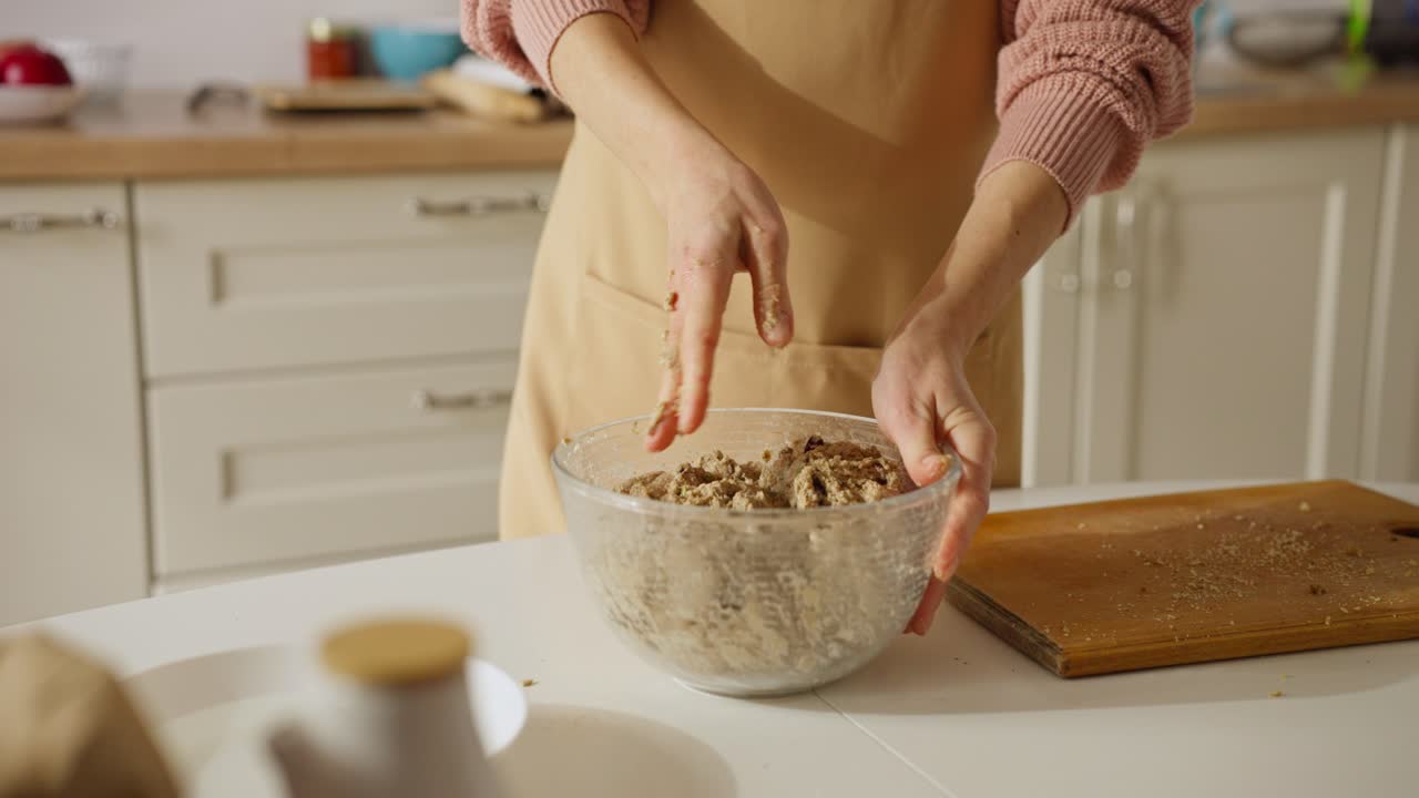 Preparing dough for baking in the kitchen