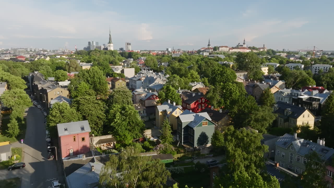 Aerial tracking shot of Estonian homes in the Kalamaja, Tallinn, summer day