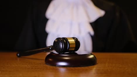 a judge striking the gavel, symbolizing authority and the crucial role in the legal systems decisionmaking