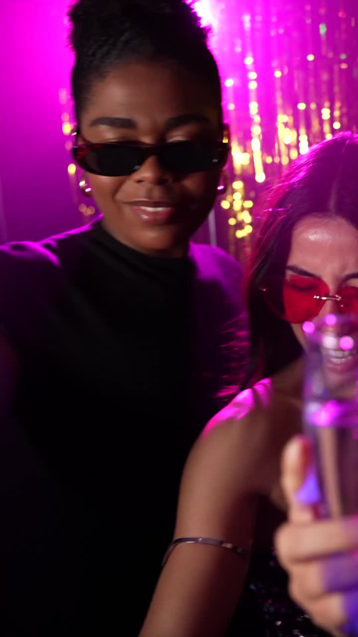 Friends celebrating with champagne at a party