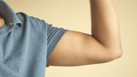 a close-up of a man's flexed bicep