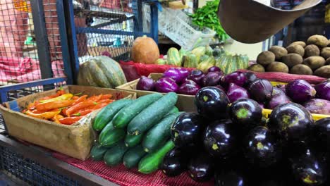view of vegetables and fruits on a market stall.