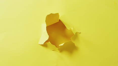 video of close up of tron yellow paper on yellow background