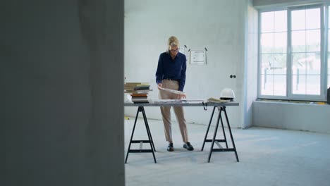 interior designer reviewing samples in a new construction home