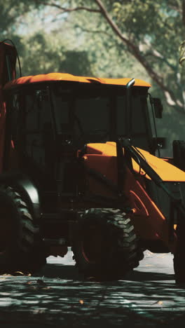 orange excavator on a construction site