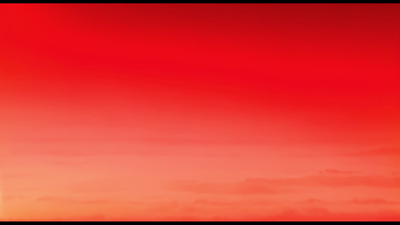 Animation of red shapes moving on orange background