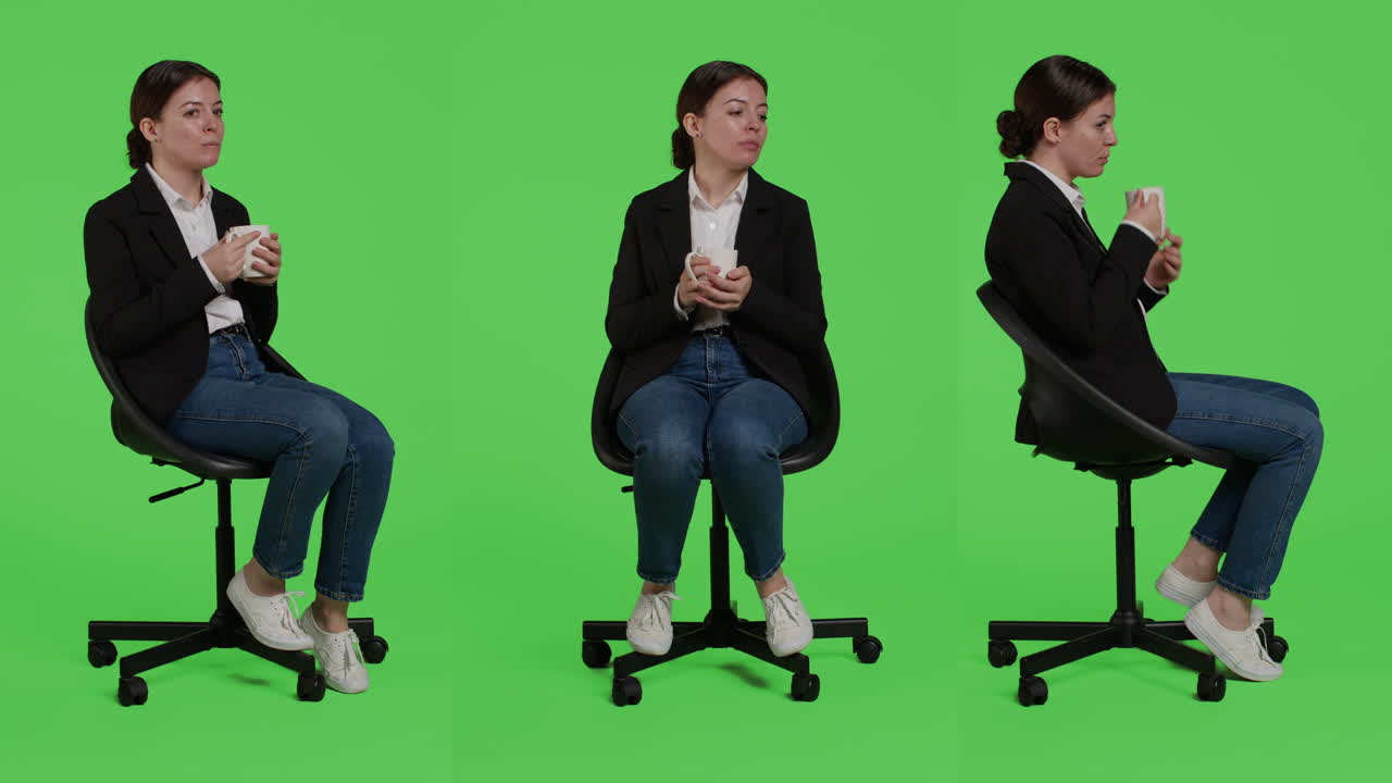 Businesswoman on Office Chair Drinking Coffee