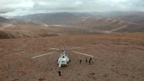 helicopter landing in a mountainous landscape