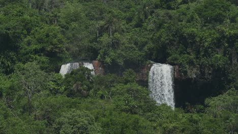 Amazing-Picturesque-Rainforest-Landscape-Hiding-Colourful-Waterfalls-in-Jungle,-Beautiful-Trees-and-Green-Scenery-with-Large-Group-of-Huge-Waterfalls-Hidden-in-Iguazu,-Brazil