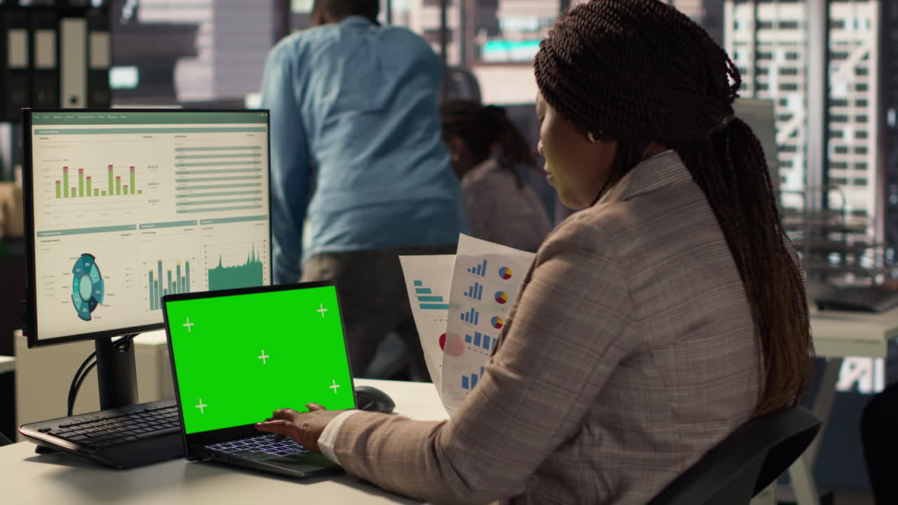 Businesswoman reviewing data in a modern office setting