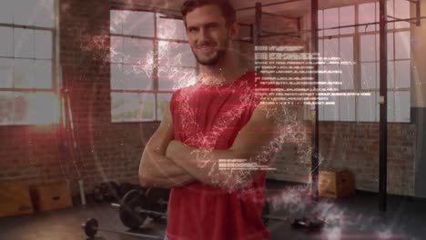 Medical-data-processing-against-portrait-of-caucasian-fit-man-smiling-while-standing-at-the-gym