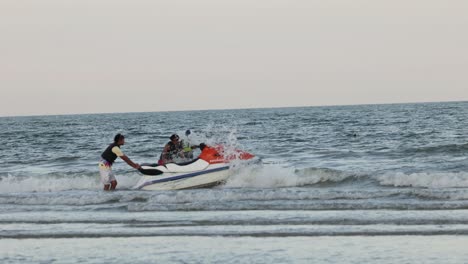 people enjoying a jet ski ride on ocean waves