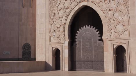 Entrance-door-to-Casablanca's-Hasan-II-Mosque,-a-prominent-symbol-of-Islamic-architecture-and-culture-in-Africa