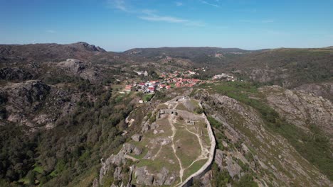 fly above castle of castro laboreiro in portugal