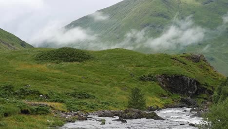 still slow motion shot of clouds and rolling hills in scottish highlands edinburgh scotland uk 1920x1080 hd