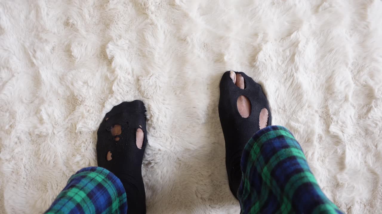 Worn socks with holes