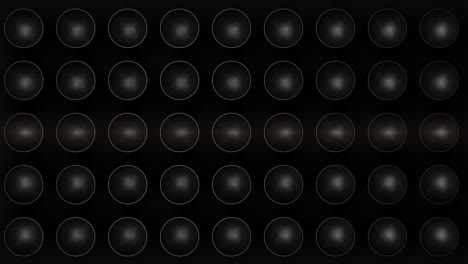 black background with a grid of circles