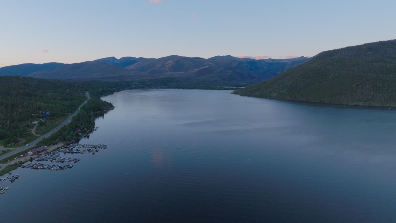 Orbiting shot of Shadow Mountain Lake at sunset in Colorado
