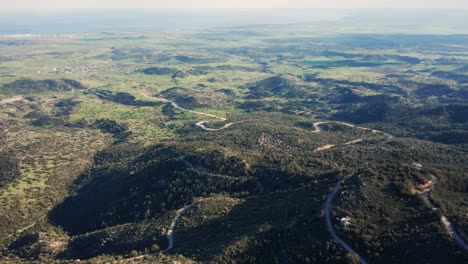 Aerial-landscape-of-Kyrenia-mountains-and-Mediterranean-Sea-in-background,-Cyprus