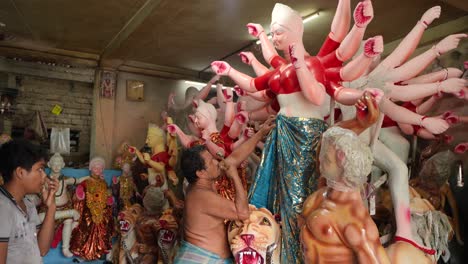 making durga idols for durga puja festival in india