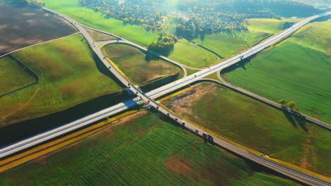 drone view cars moving on highway junction. landscape road junction on highway