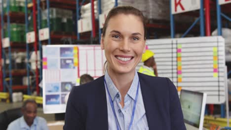 portrait of a young woman in a warehouse smiling 4k