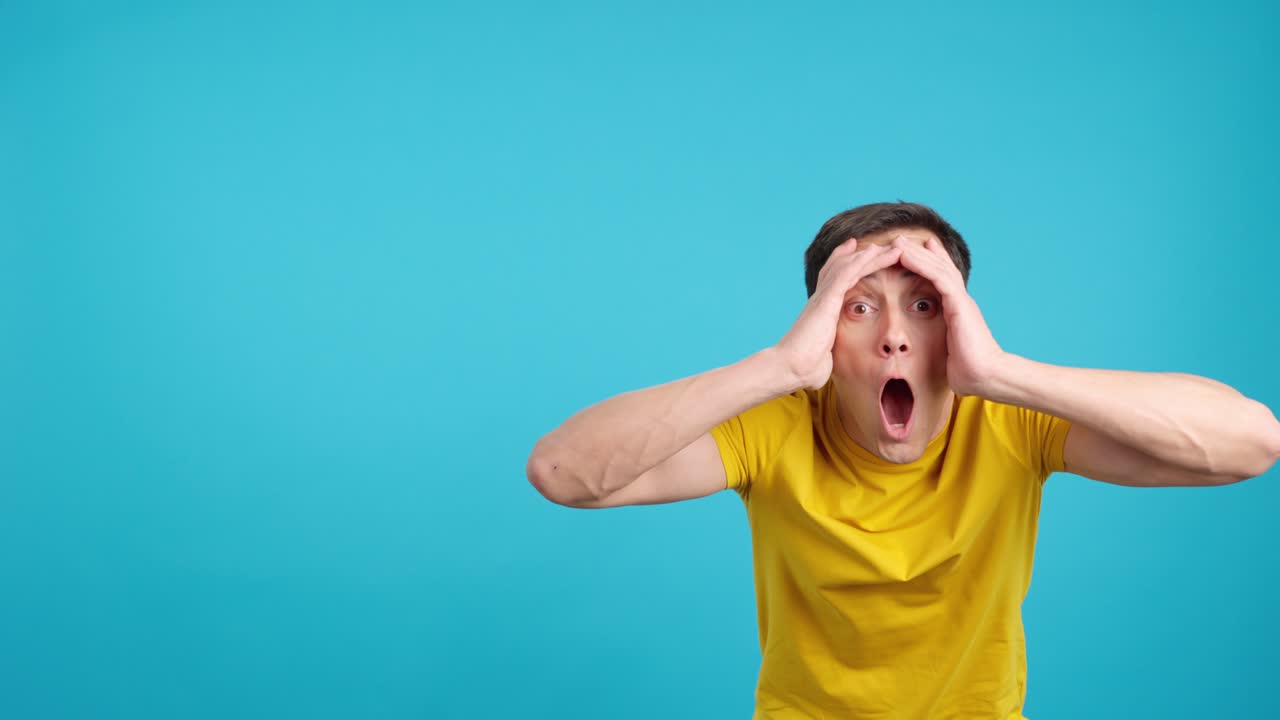 Man pointing and reacting to something